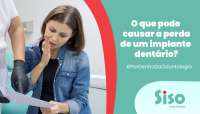 O que pode causar a perda de um implante dentário?